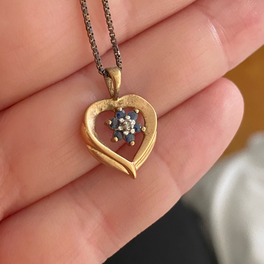 Gold, sapphire, and diamond heart pendant